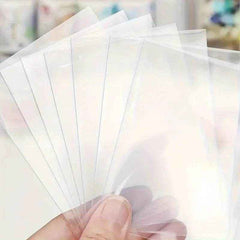 🛡️ Keep Those Precious Cards Safe: 100pcs Transparent Durable Card Sleeves for Boys Who Love Their Collections - ThiGui