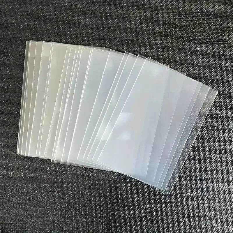 🛡️ Keep Those Precious Cards Safe: 100pcs Transparent Durable Card Sleeves for Boys Who Love Their Collections - ThiGui